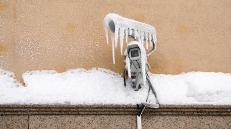 Transparent heater for CCTV camera