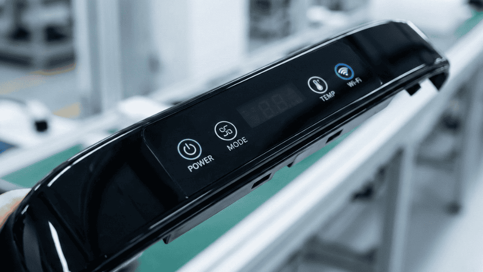 Backlit graphics using IMD technology in electronic components