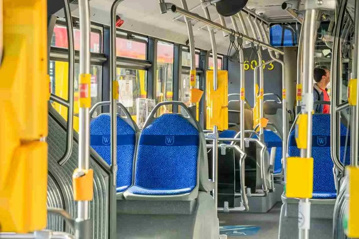 Public transport bus interior with blue patterned seats